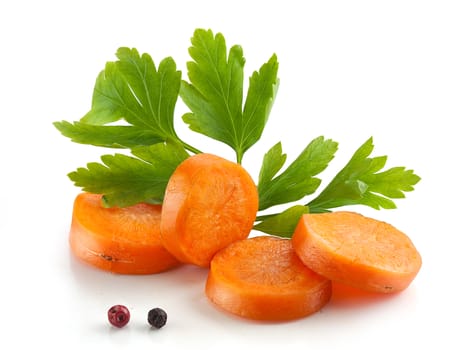 Hanfdul of orange sliced carrot with a fresh green parsley and pepper