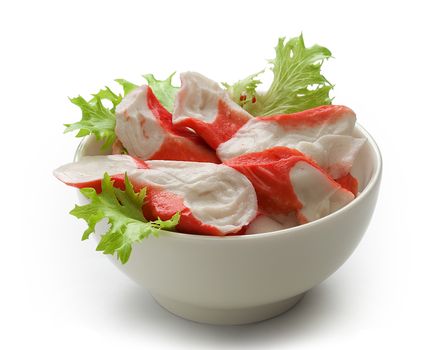 Crab meat with fresh green lettuce in the bowl