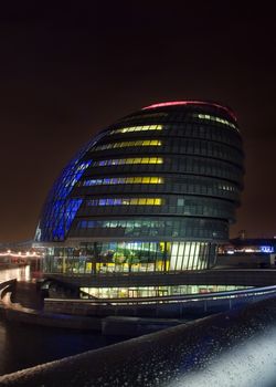 London, United Kingdom - February 10th, 2007: London city hall illuminated in the evening