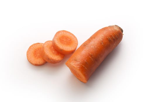 Top view of sliced orange carrot on the white background