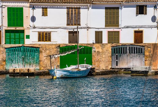 Idyllic view of old fisher boat at the coast on mediterranean village on Mallorca island, Spain