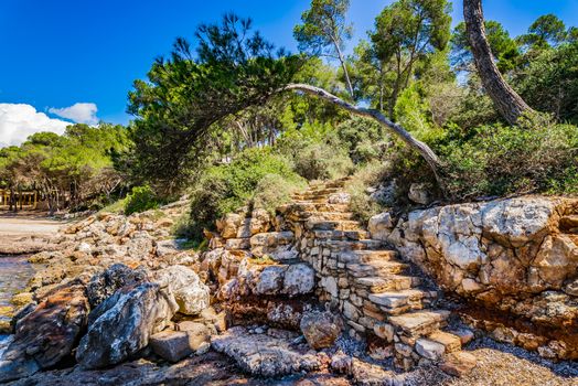 Rustic stone staircase in beautiful mediterranean landscape