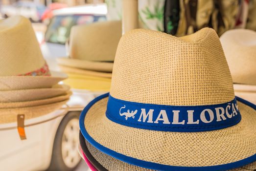 Close-up of beach sun hat, head accessory and souvenir on Majorca island