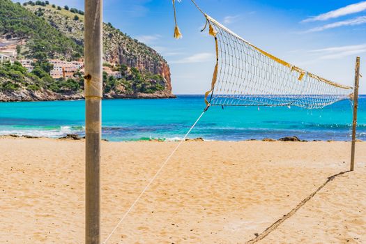 View of volleyball net on beautiful sand beach