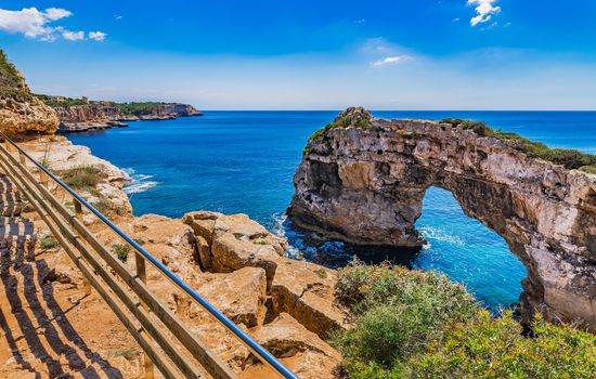 Idyllic view of the natural landmark, Es Pontas, natural rock arch on Mallorca island, Spain