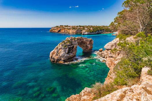 Spain Mediterranean Sea, beautiful view of the natural landmark Es Pontas, natural rock arch on Mallorca island