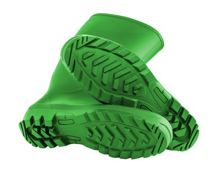 a pair of green clean and new rubber boots isolated on white background.