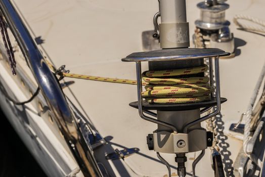 Winch and rope, sailing yacht detail view, close-up