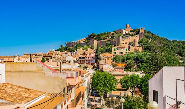 View of the fortification and roofs of the old town Capdepera, Majorca Spain