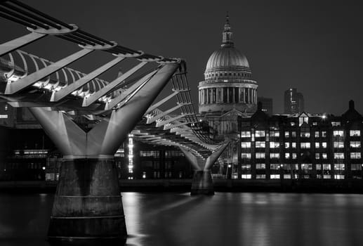 London, UK - Jan 2020: St Paul's Cathedral along the length of Millennium Bridge, Black and White