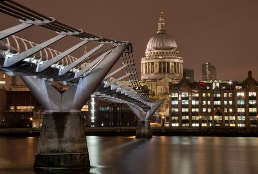 London, UK - Jan 2020: St Paul's Cathedral along the length of Millennium Bridge