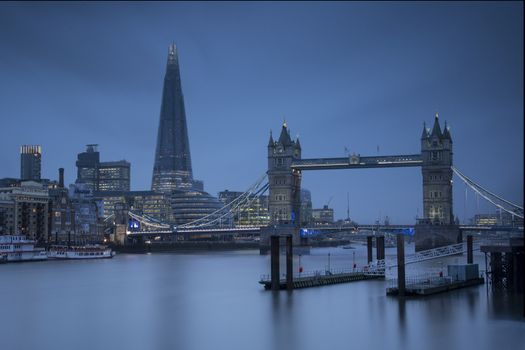 London, UK - Jan 2020: View over the Thames, taking in Tower Bridge, The Shard and City Hall