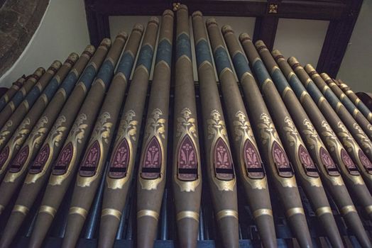 UK, Launde Abbey, Leicestershire - July 2018: Painted Pipes of the Speechley Organ in the Chapel