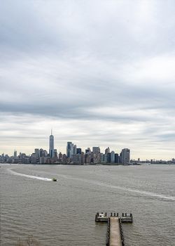 USA, New York, Ellis Island - May 2019: View of Manhattan from Liberty Island