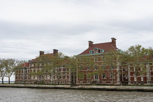 USA, New York, Ellis Island - May 2019: Ellis Island Visitor Centre and Museum - Hospital site under restoration
