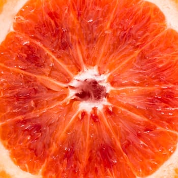 Close-up of red blood sicilian orange, food background.