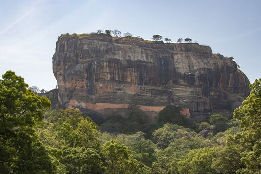 Sri lanka, Sept 2015: Sigiriya Rock Fortress in Sri Lanka. The rock is nearly 200 meters (660 feet) tall and is home to the ruins of a fortress as well as an ancient palace complex.