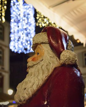 FRANCE, STRASBOURG - 20 DECEMBER 2017: Christmas street decoration featuring Santa Claus. The whole town centre is decked out in lights and decorations every December.