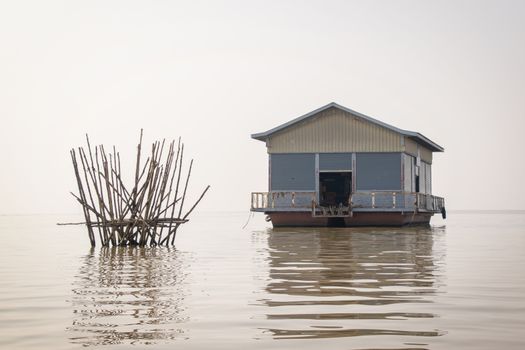 Cambodia, Tonle-Sap - March 2016:.Floating warehouse