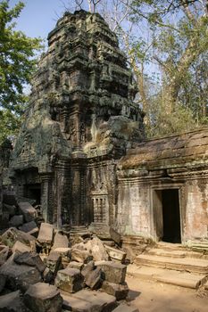 Cambodia, Siem Riep- March 2016: Ta Phrohm temple has been recovered from the Jungle are partially rebuilt by archeologists