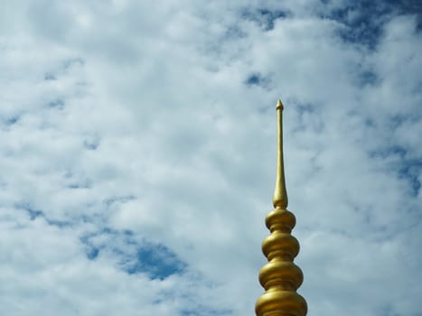 Golden pagoda On the background is an empty blue sky Minimal concept.