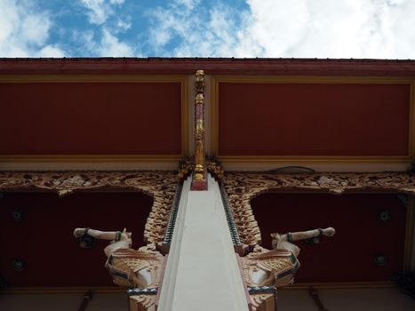 Under the roof of a Thai temple church.