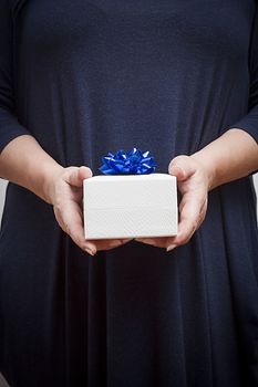 Gift in the hands of a woman