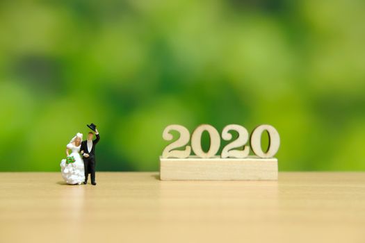 Miniature people - concept for wedding plan in 2020