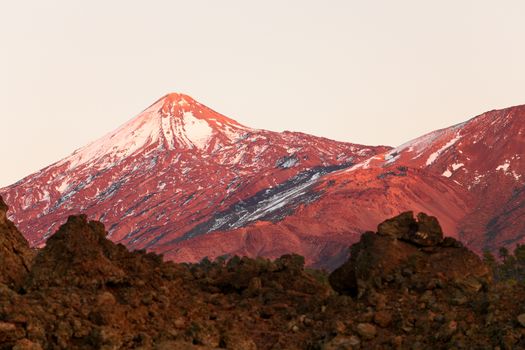 Tenerife - Teide volcano landscape. Beautiful nature scenery at from Teide national park with snowy mountain peak on Canary Islands, Spain.