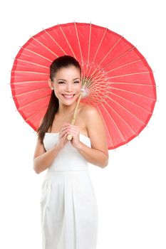 Chinese wedding woman with red paper umbrella. Beautiful mixed race Chinese Asian / Caucasian girl isolated on white background smiling pretty
