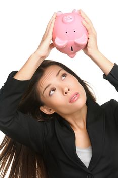 Empty piggy bank. Money debt, bankruptcy and lost savings concept. Business woman or banker showing empty pink piggy bank isolated on white background.