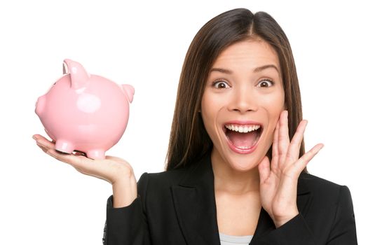 Woman holding piggy bank screaming and shouting excited and funny. Savings and banking with happy businesswoman holding pink piggy bank. Investment and savings concept.