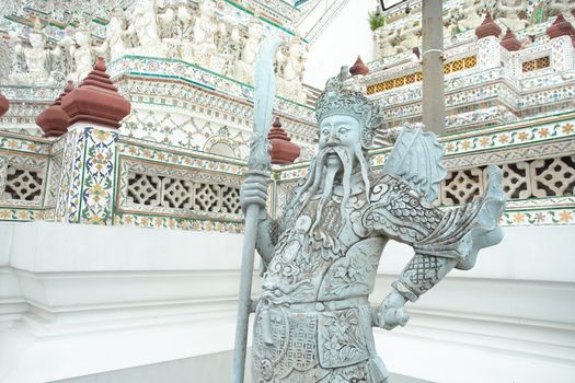 Bangkok, Thailand - September 2, 2018: Chinese giant stone statue in Wat Arun, Bangkok, Thailand. As the solier guard in the faith of Thai people and often meet this statue in the famous temple in Thailand.