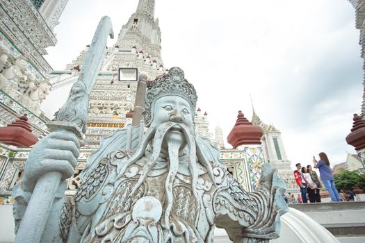 Bangkok, Thailand - September 2, 2018: Chinese giant stone statue in Wat Arun, Bangkok, Thailand. As the solier guard in the faith of Thai people and often meet this statue in the famous temple in Thailand.