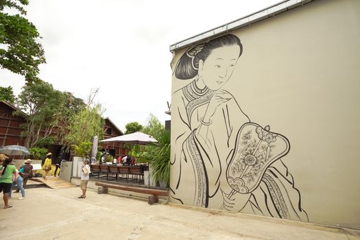 Bangkok, Thailand - September 2, 2018: Chinese style mural in Lhong 1919. The old pier in the past became to a new attraction in Bangkok, Thailand.