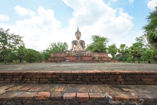 Ancient Buddha in Wat Mae Chon, Sukhothai Province, Thailand.