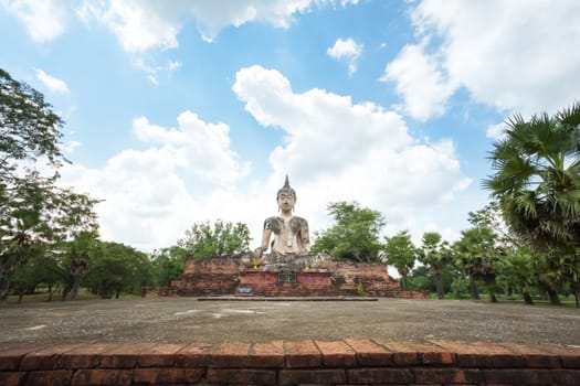 Ancient Buddha in Wat Mae Chon, Sukhothai Province, Thailand.