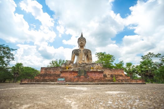 Ancient Buddha in Wat Mae Chon, Sukhothai Province, Thailand.