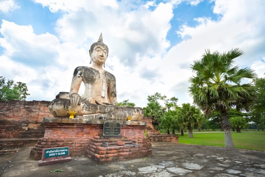 Ancient Buddha in Wat Mae Chon, Sukhothai Province, Thailand.