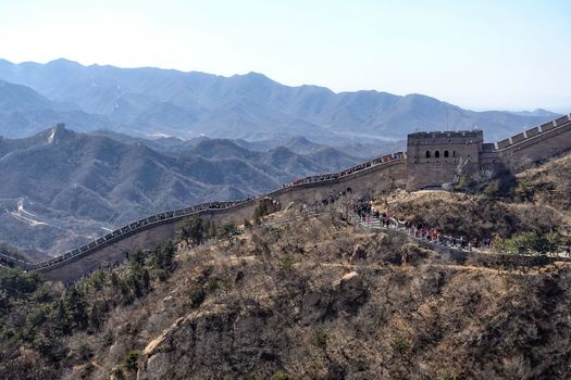 Tourists visiting the Great Wall of China near Beijing.