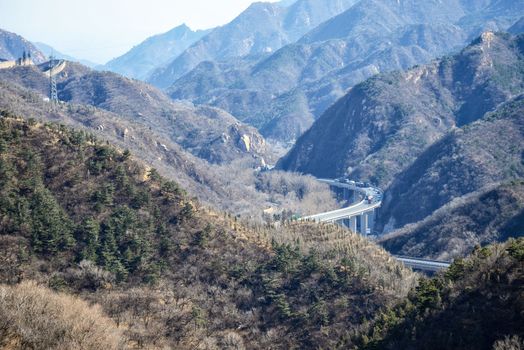Highway between the mountains near the Great Wall of China in the mountains near Bejing.