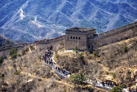 Tourists visiting the Great Wall of China near Beijing.