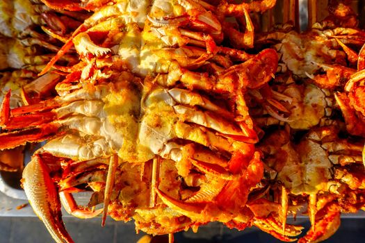 Exotic snacks and desserts can be found in this famous market Donghuamen Night food market near Wangfujing street, Beijing, China