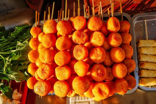 Exotic snacks and desserts can be found in this famous market Donghuamen Night food market near Wangfujing street, Beijing, China