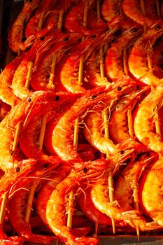 shrimp on a stick - the local refreshment specialities in china market in beijing