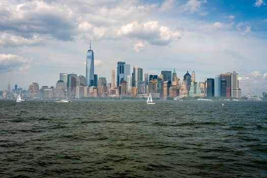 Skyline and modern office buildings of Midtown Manhattan viewed from across the Hudson River. - Image