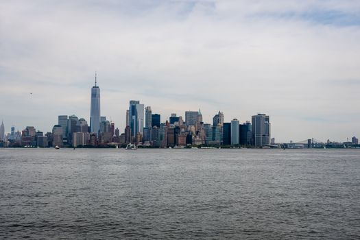 Skyline and modern office buildings of Midtown Manhattan viewed from across the Hudson River. - Image