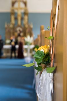 Church wedding decoration with flowers and ears.