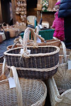 In the christmas  market a wide selection of a variety of hand-braided baskets.