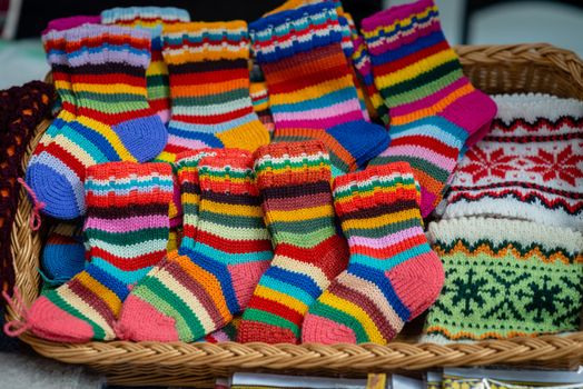 Traditional Latvian knitted woolen mittens and socks